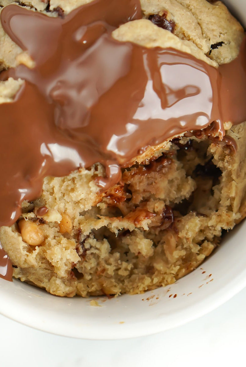Love Fitness Banana Bread Chocolate chip muffin recipe photo with peanut butter chocolate drizzle on top.