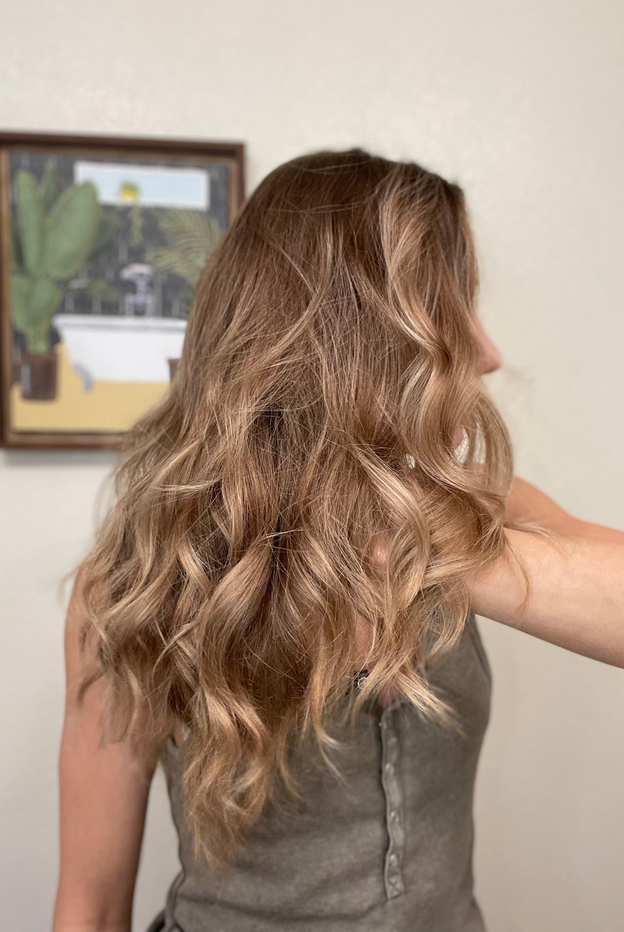 Hair curls after curled with Love Fitness leggings.