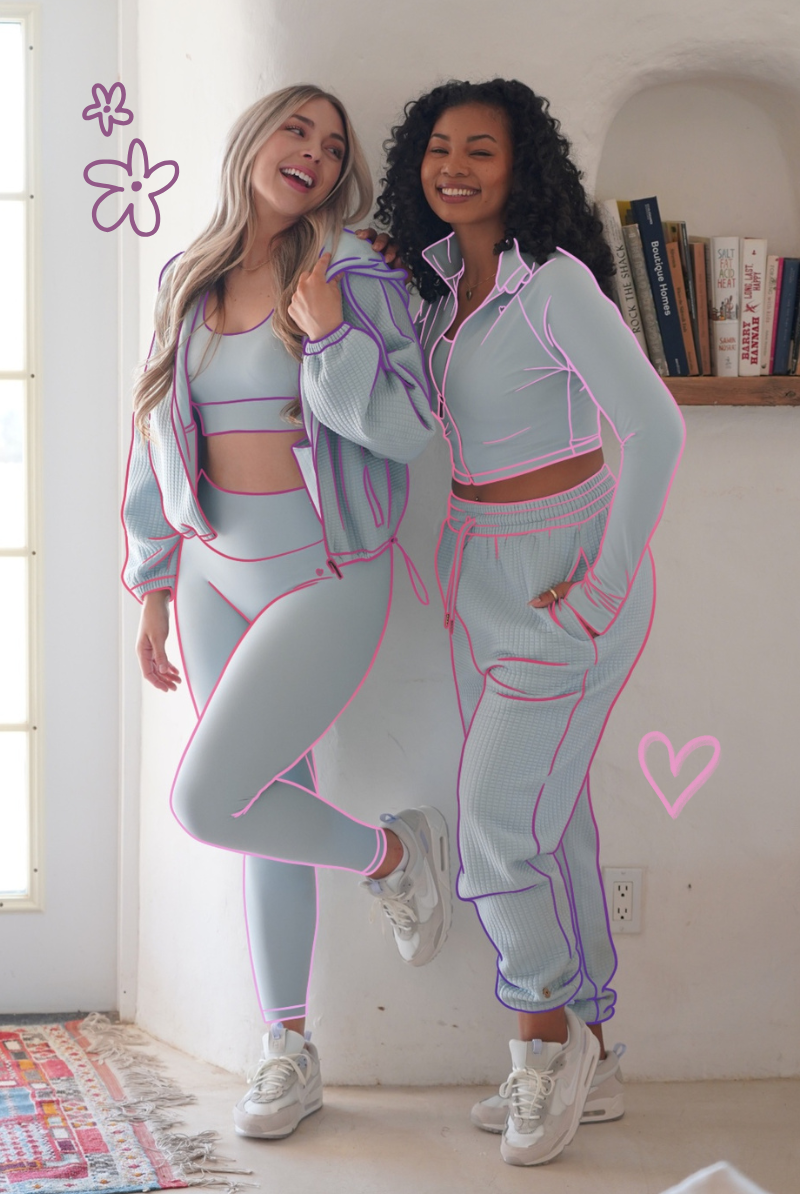 Two Female Models with Pink and Purple Graphics