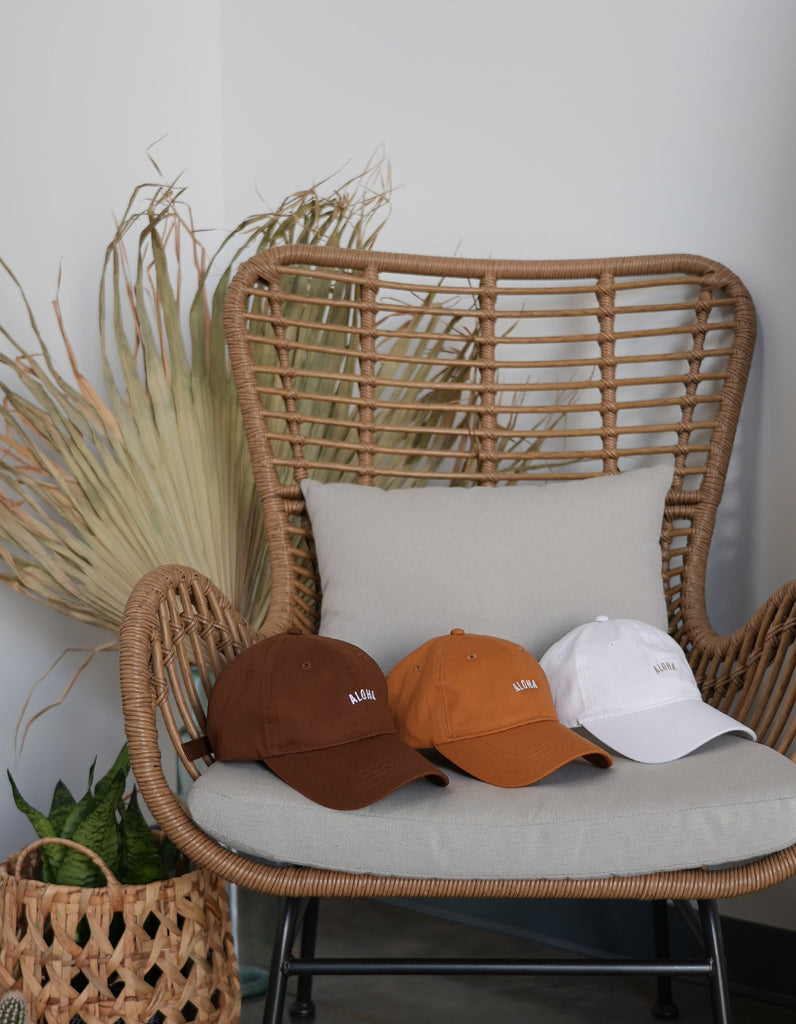Love Fitness Aloha Dad Hats shown in 3 different colors. Brown, Burnt Orange & white
