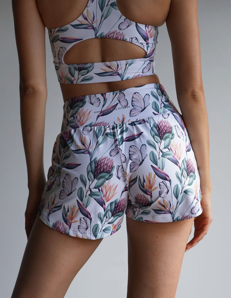 Love Fitness Island Dreams Runners with a beautiful tropics print textile.