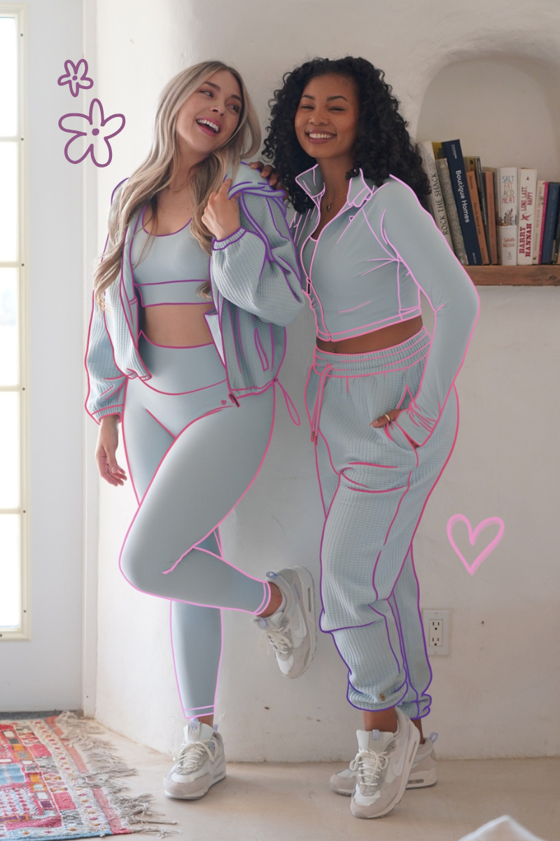 Two Female Models with Pink and Purple Graphics 