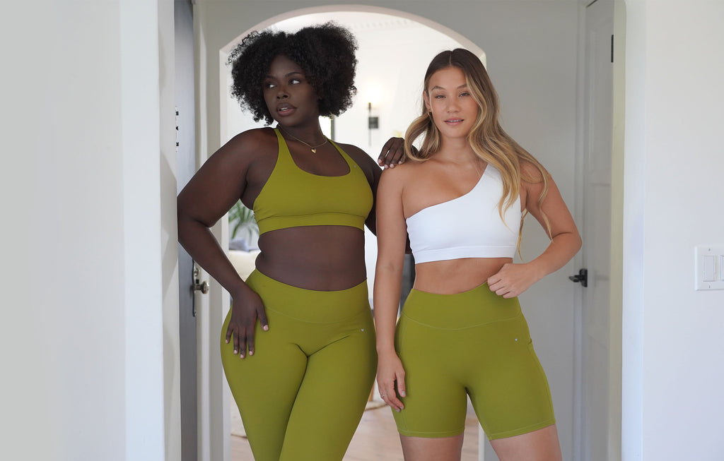 Love Fitness Bloom Collection. 2 beautiful diverse models wearing mix and match colors guava green and lilies white in mix and match styls.