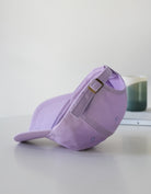 Love Fitness Aloha Dad hat in the beautiful  purple lavender color and showing the back with the adjustable strap and beautiful bronze detailing
