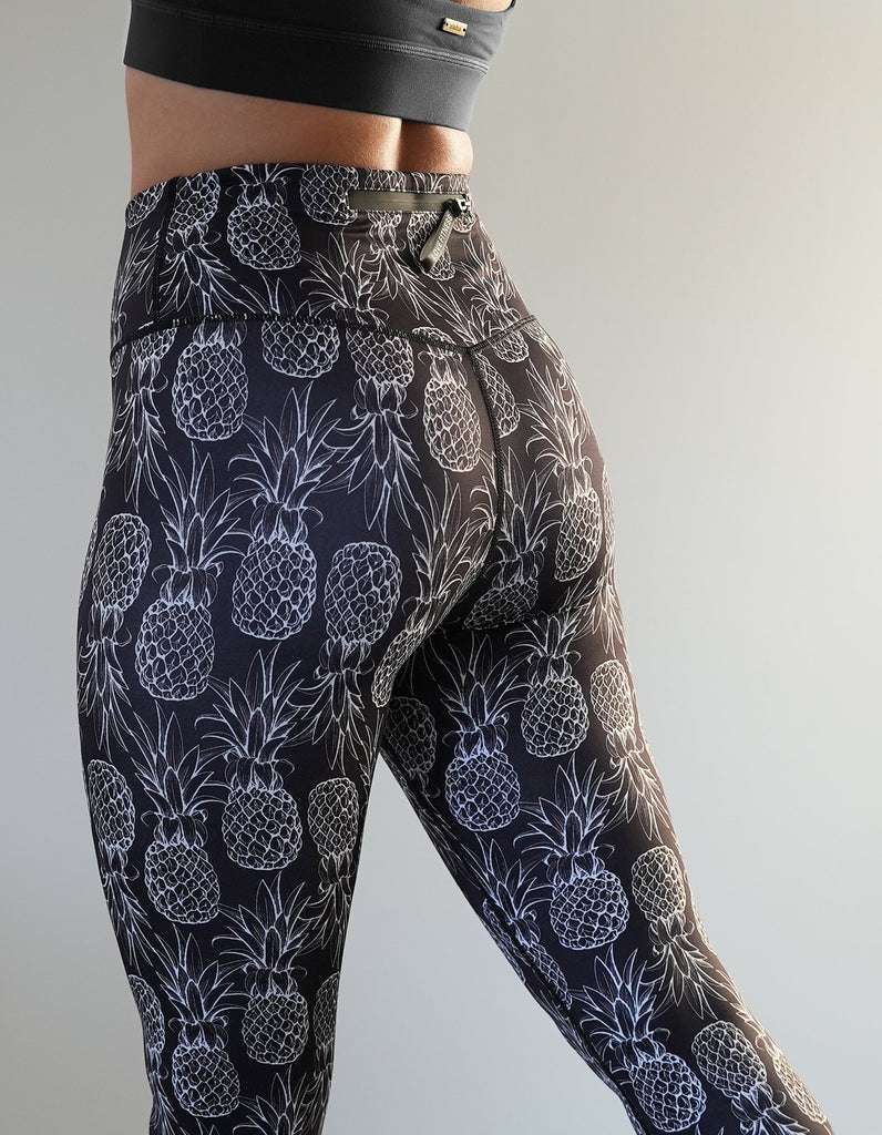 Love Fitness most popular pineapple leggings in black. Work out, going out and ocean approved