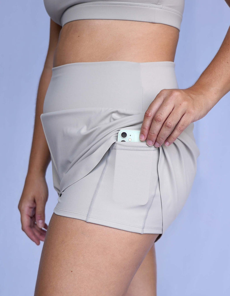 Love Fitness Breeze Runners for running shorts in the color stone with spandex liners and pockets on both sides