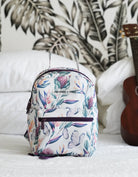 The cutest mini back pack for on the go eseentials with a gorgeous island dream print with tropical flowers and butterflies. Love Fitness 