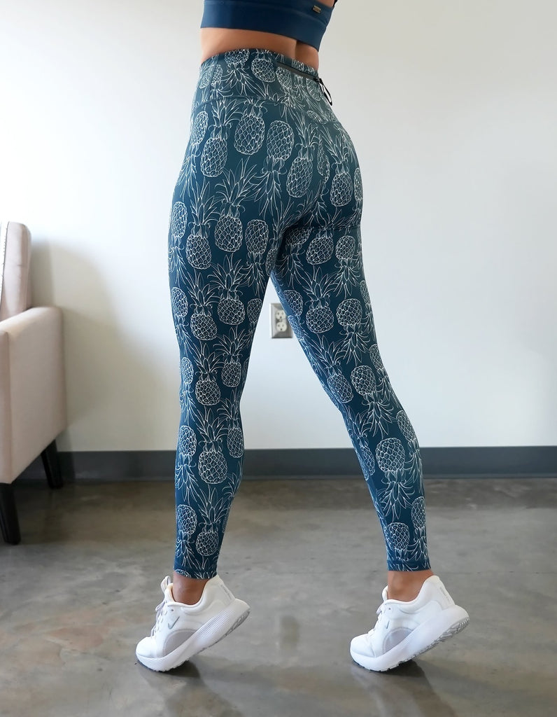 Love Fitness most popular pineapple leggings in the color ocean blue. Work out, going out and ocean approved
